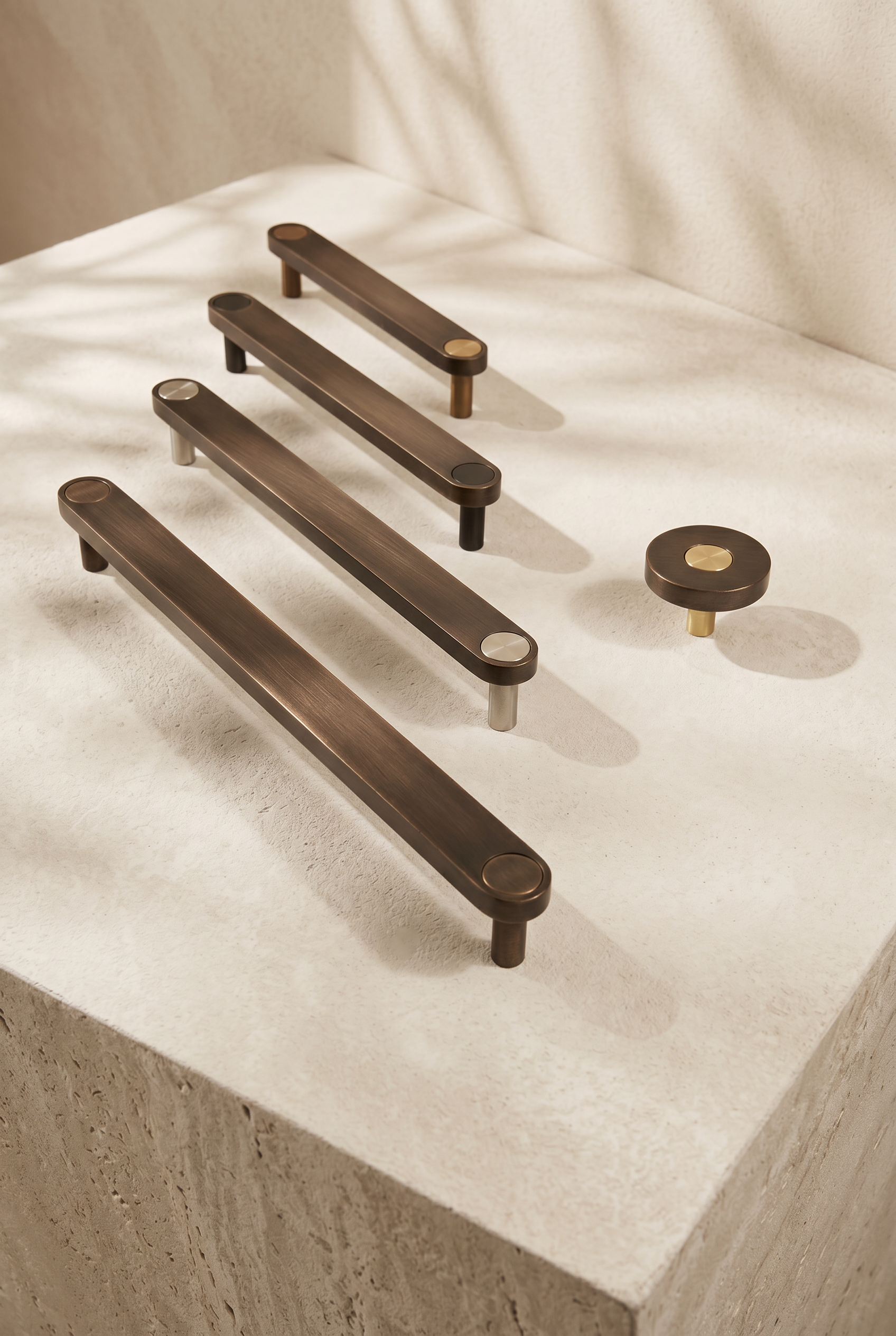 Ensemble Aged Bronze Handle — modular cabinet handle by Sloan Roberts. Rich aged bronze finish, available as knob or bar in four sizes with choice of button detail. Designed and assembled in Melbourne.