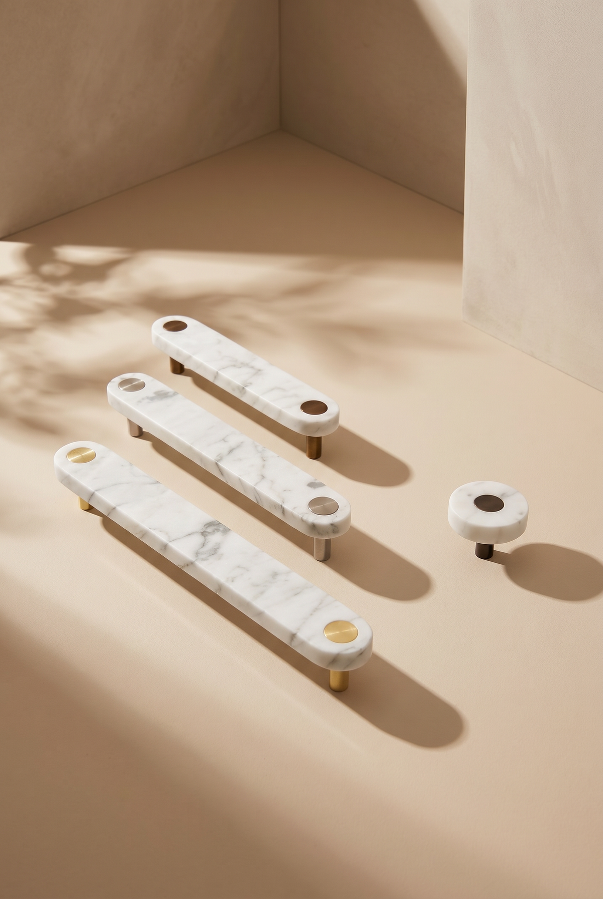 Ensemble White Marble Handle — modular cabinet handle by Sloan Roberts. Crafted from Carrara Italian marble with choice of metallic button detail.