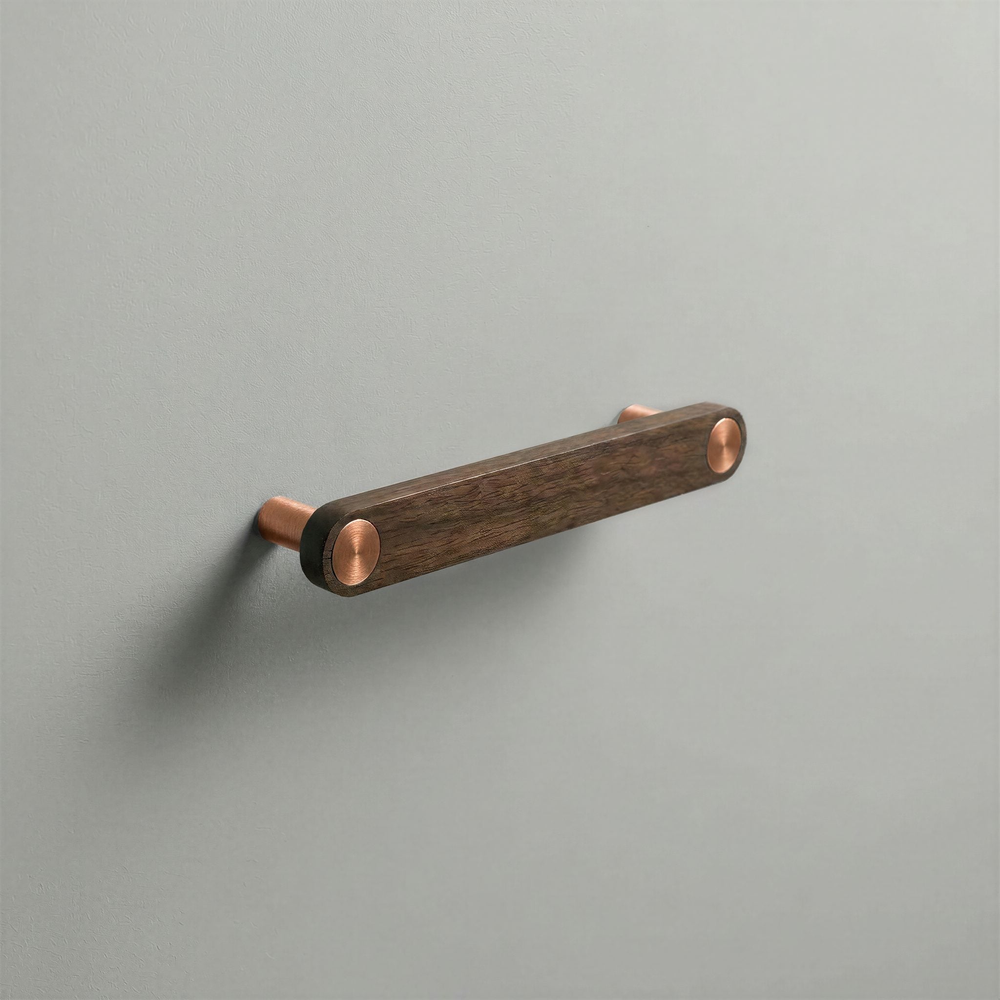 Walnut Ensemble Handle in 128mm Centres with Brushed Copper button detail by Sloan Roberts.