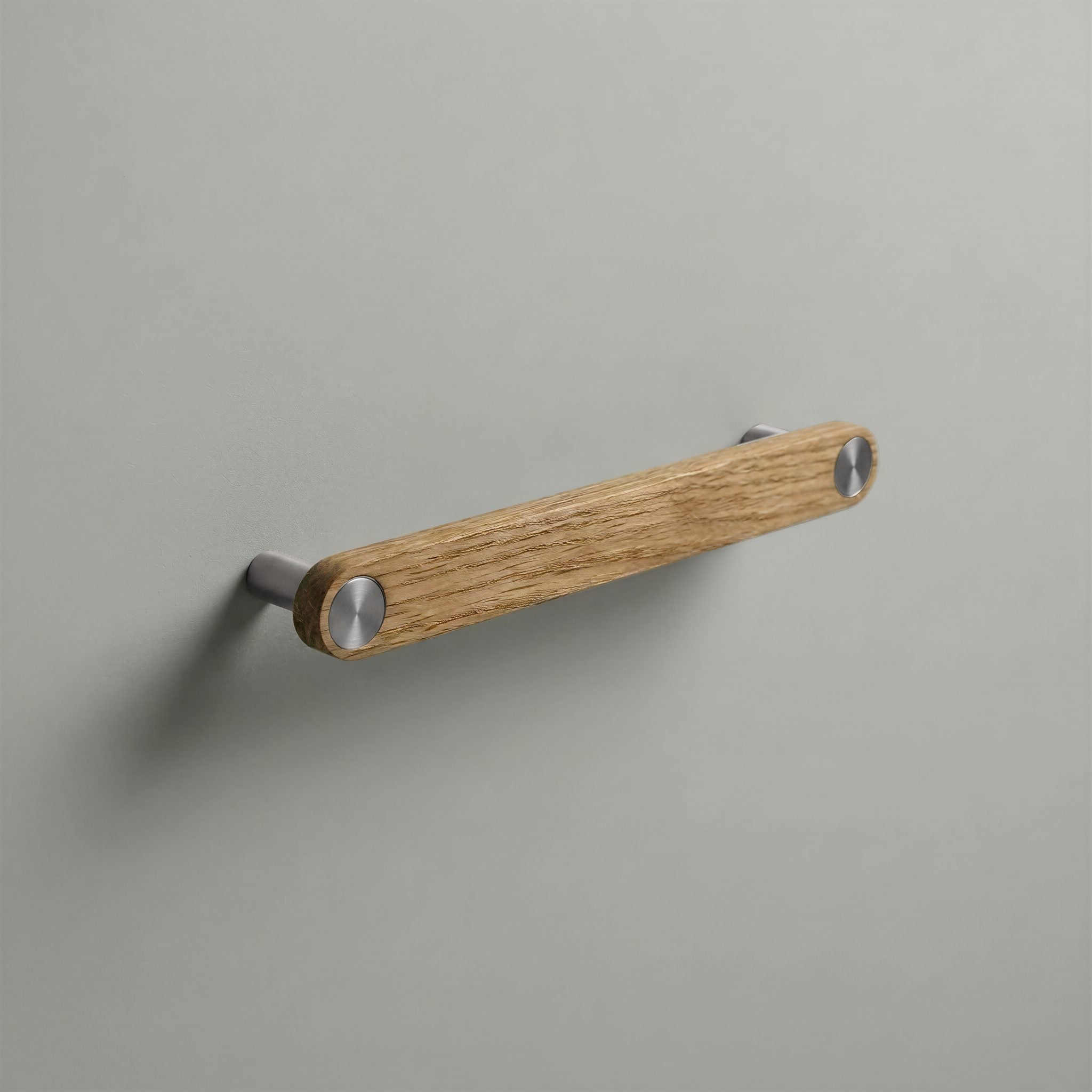Oak Ensemble Handle in 160mm Centres with Brushed Steel button detail by Sloan Roberts.