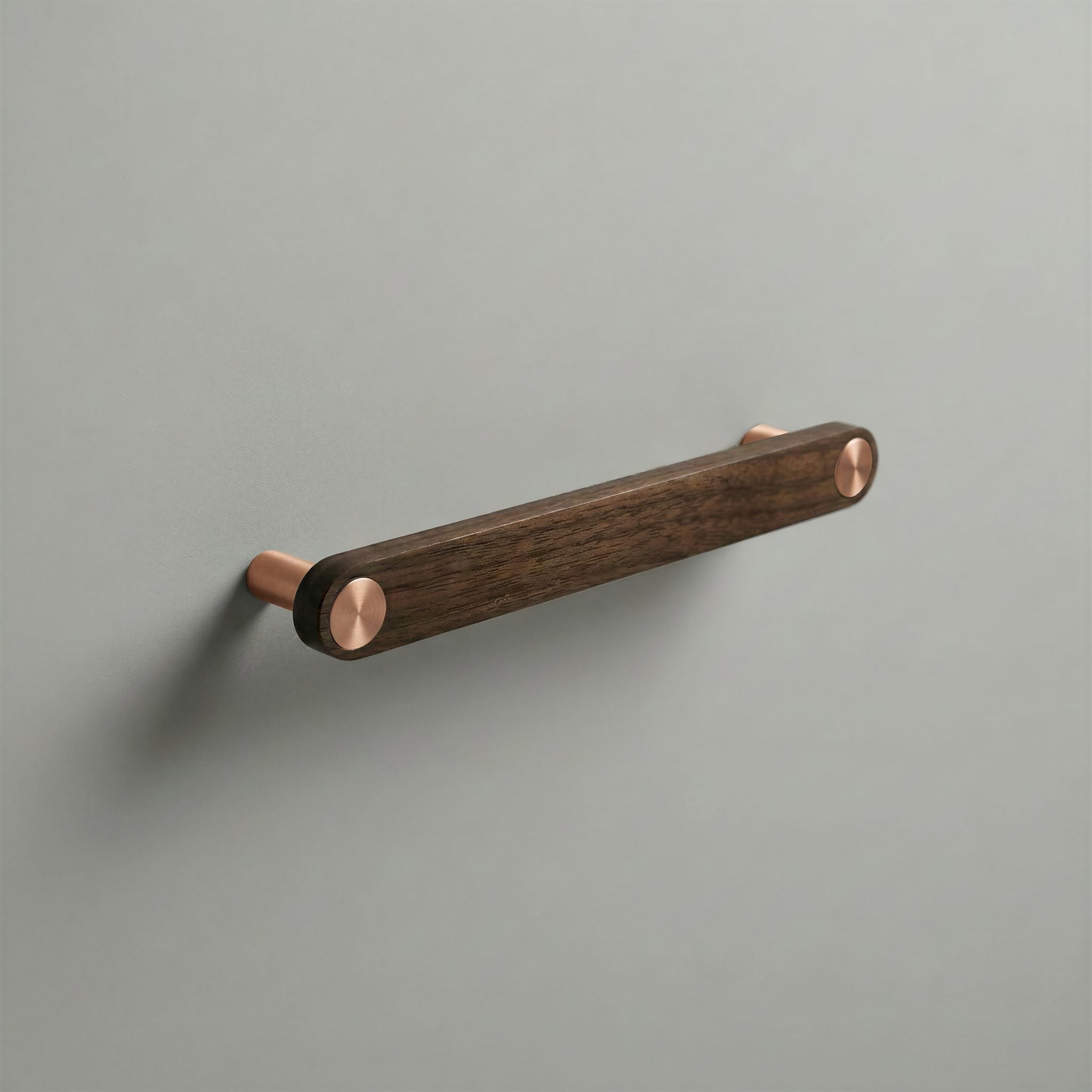 Walnut Ensemble Handle in 160mm Centres with Brushed Copper button detail by Sloan Roberts.