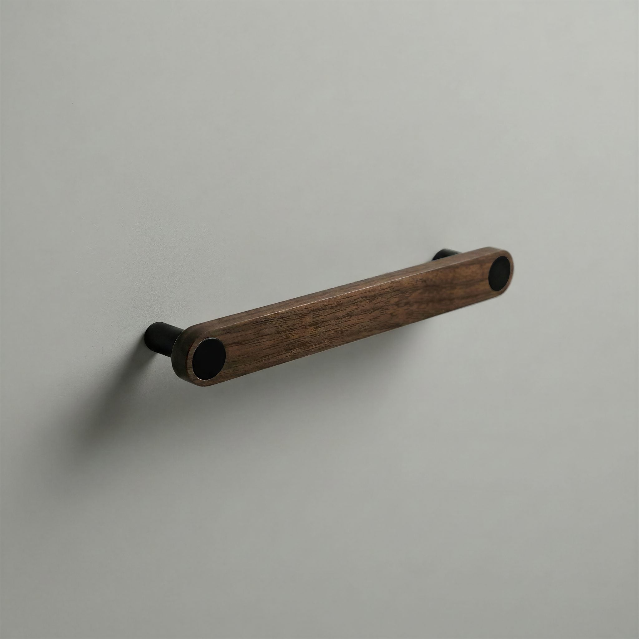 Walnut Ensemble Handle in 160mm Centres with Matte Black button detail by Sloan Roberts.