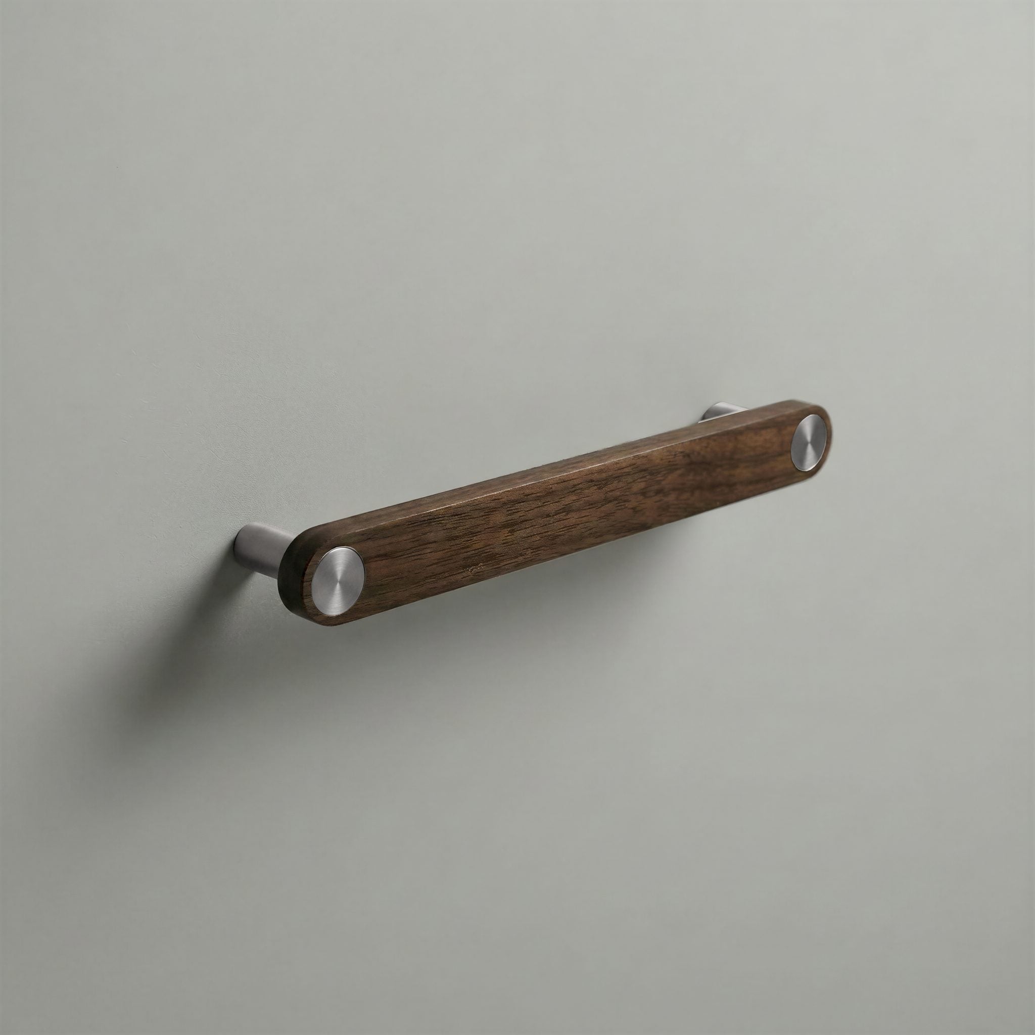 Walnut Ensemble Handle in 160mm Centres with Brushed Steel button detail by Sloan Roberts.