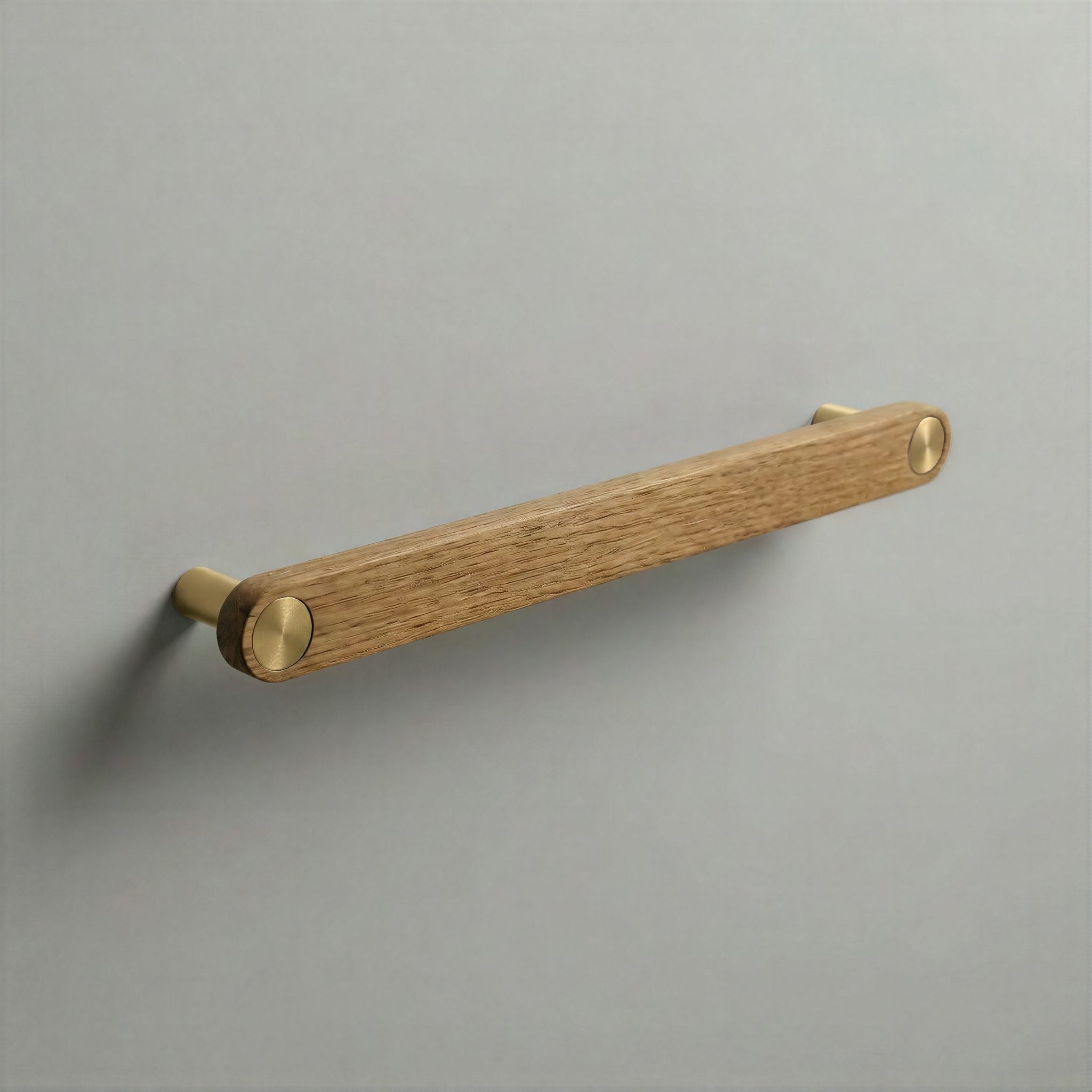Oak Ensemble Handle in 192mm Centres with Brass button detail by Sloan Roberts.