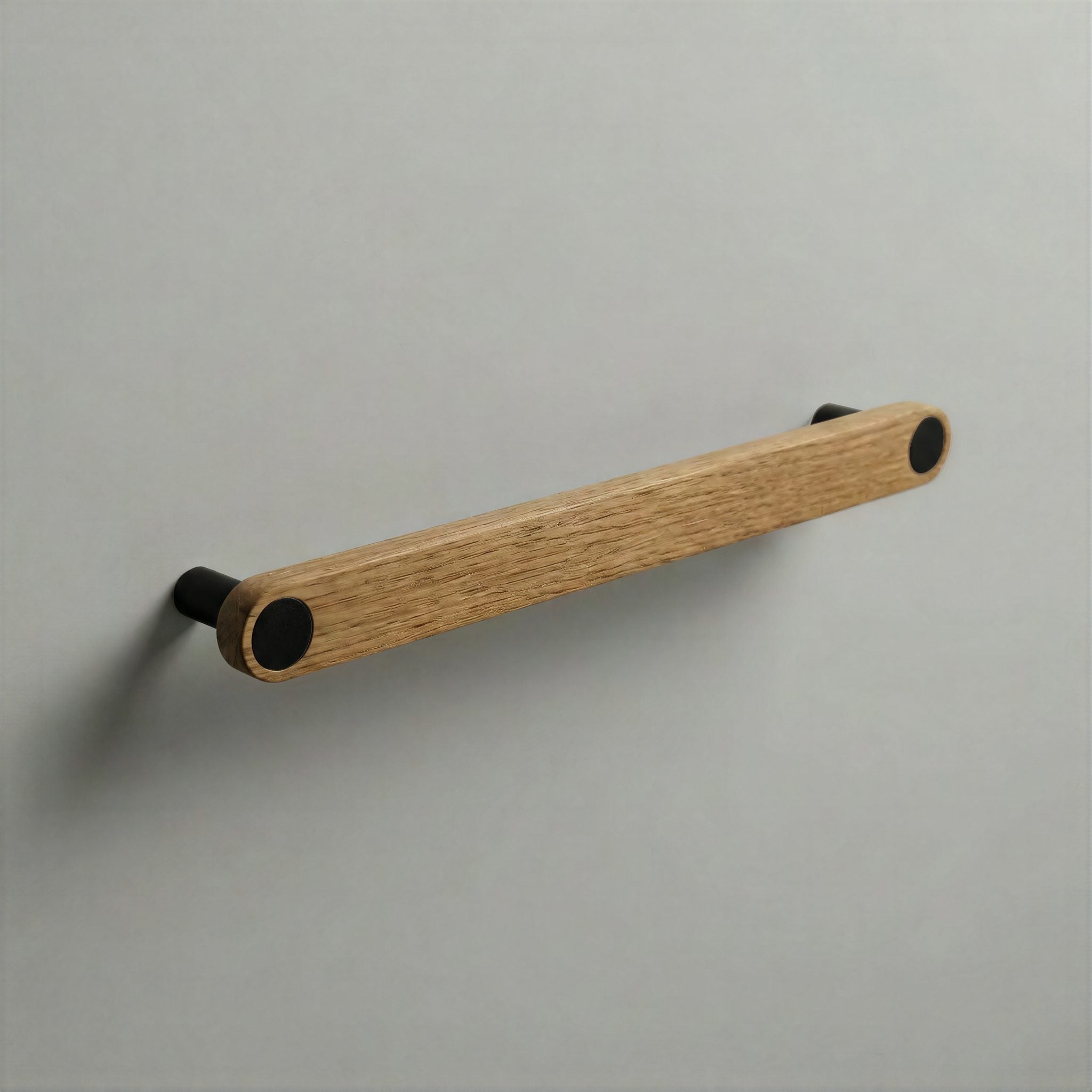 Oak Ensemble Handle in 192mm Centres with Matte Black button detail by Sloan Roberts.