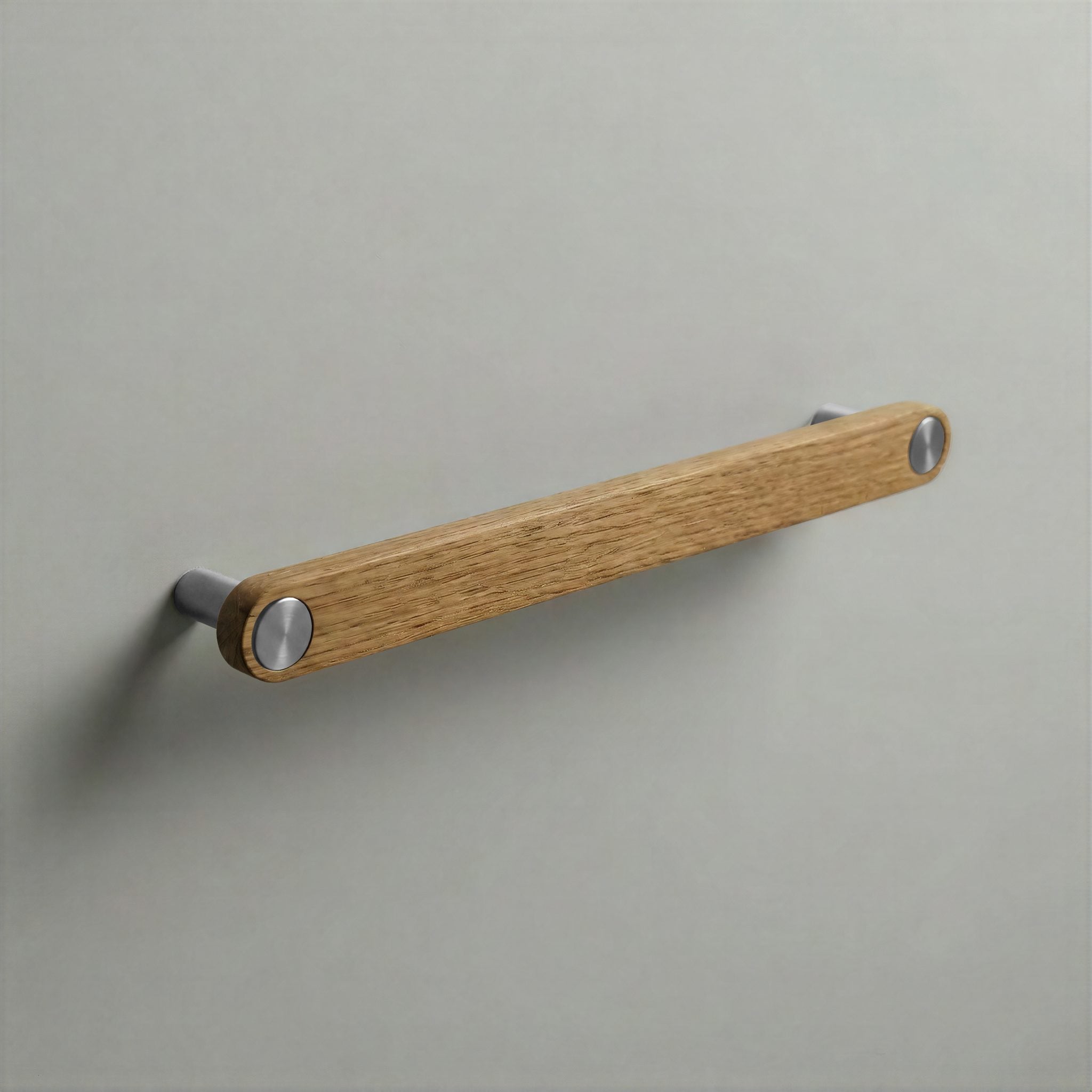 Oak Ensemble Handle in 192mm Centres with Brushed Steel button detail by Sloan Roberts.