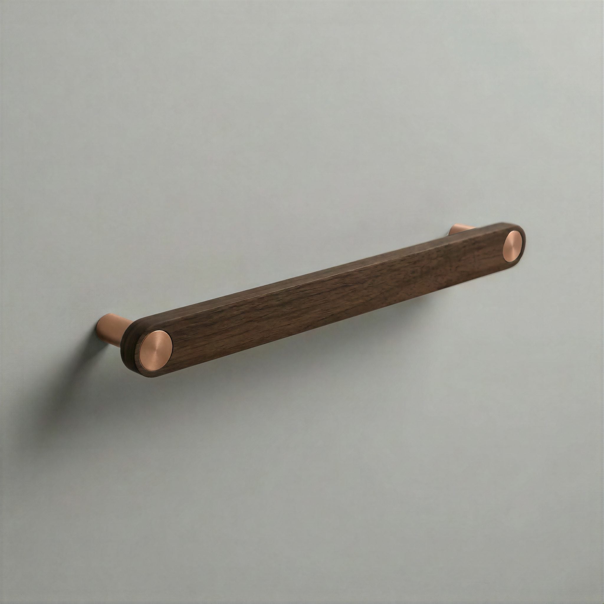 Walnut Ensemble Handle in 192mm Centres with Brushed Copper button detail by Sloan Roberts.