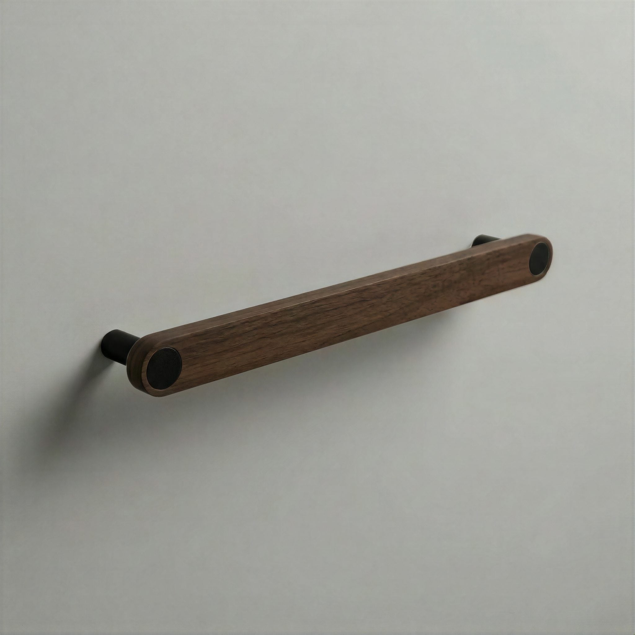 Walnut Ensemble Handle in 192mm Centres with Matte Black button detail by Sloan Roberts.