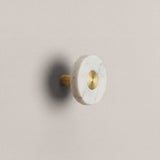 White Marble Ensemble Handle in Knob size with Brass button detail by Sloan Roberts.