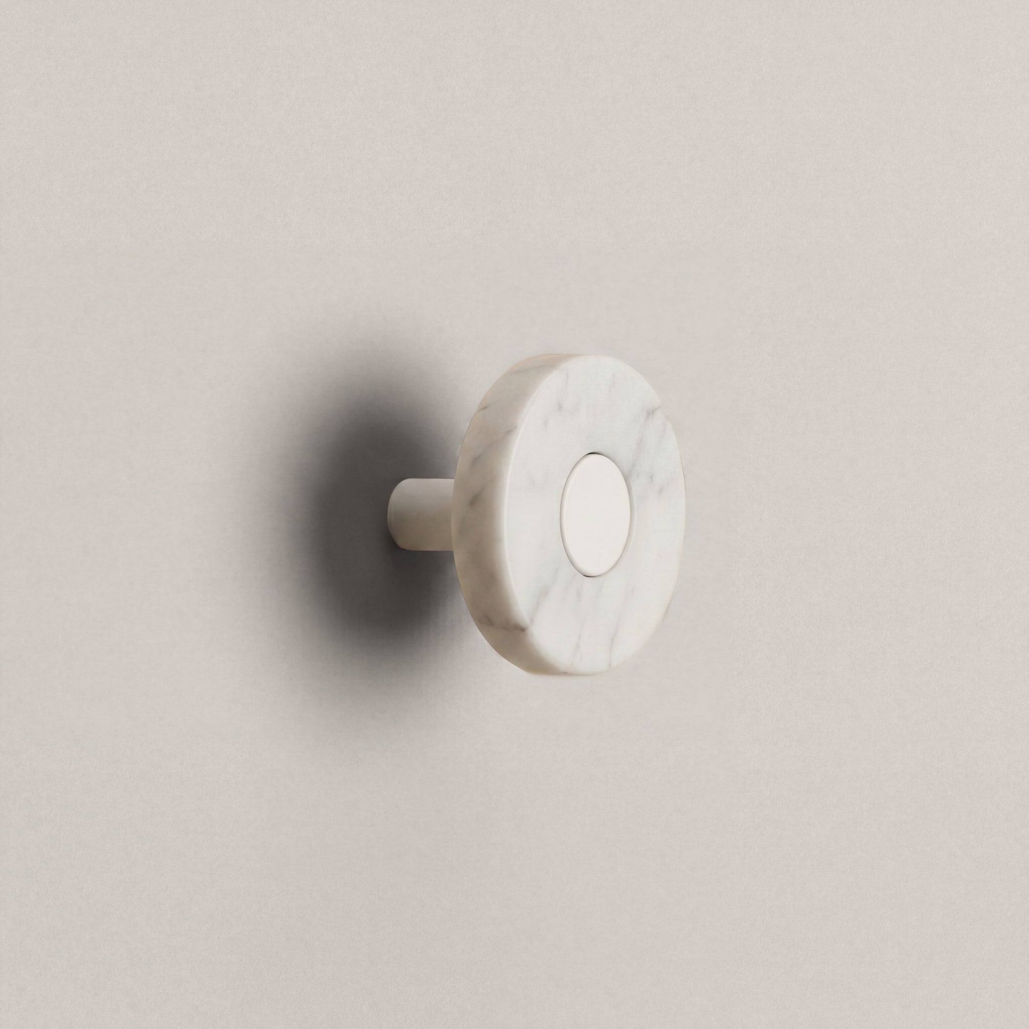 White Marble Ensemble Handle in Knob size with Matte White button detail by Sloan Roberts.