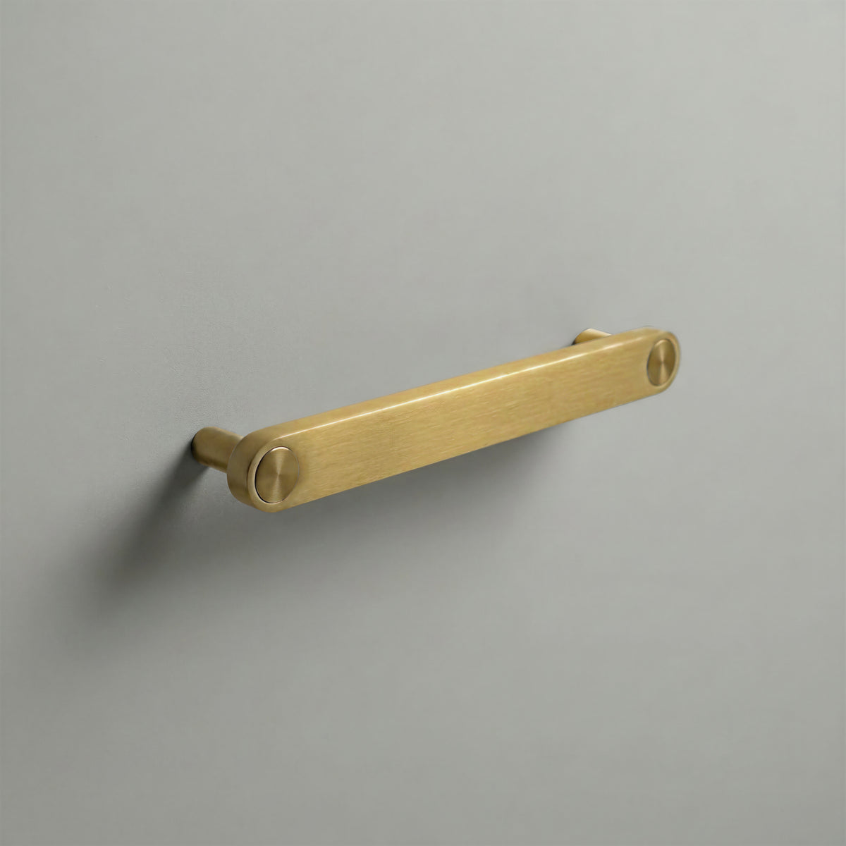 Brass Ensemble Handle in 160mm (6¼″) Centres size with Brass button detail by Sloan Roberts.