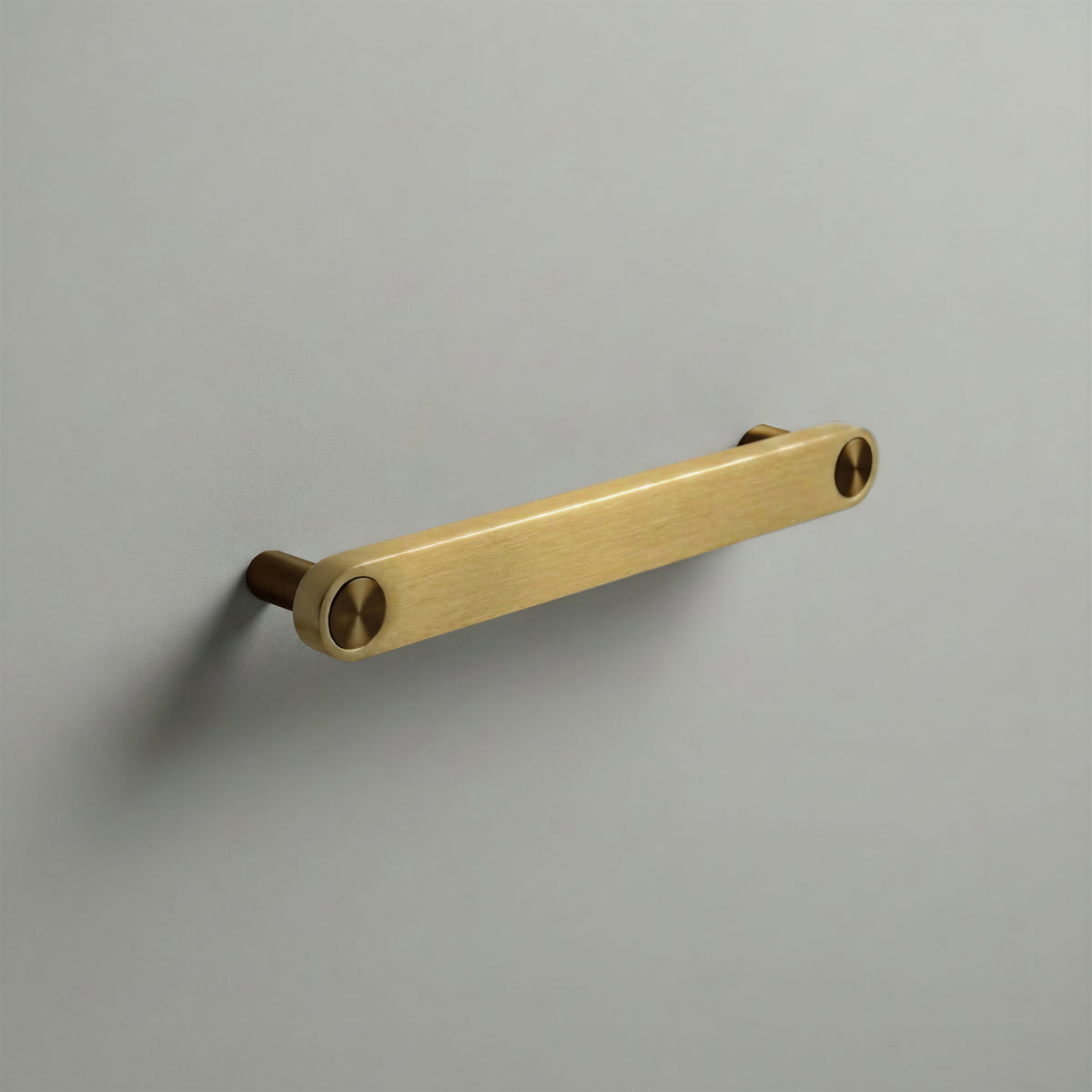 Brass Ensemble Handle in 160mm (6¼″) Centres size with Aged Bronze button detail by Sloan Roberts.
