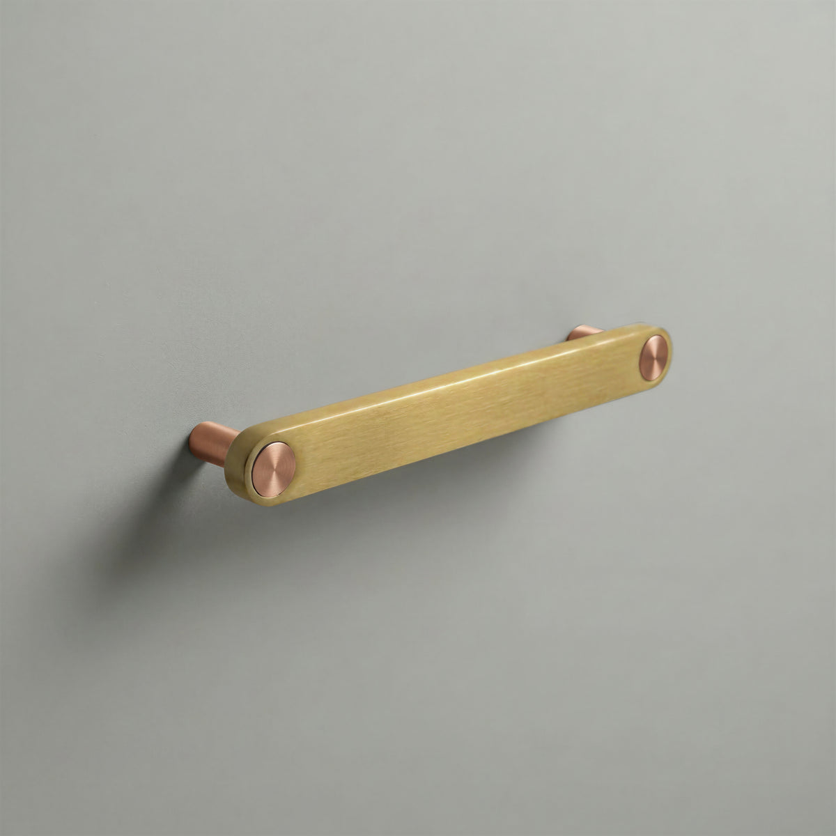 Brass Ensemble Handle in 160mm (6¼″) Centres size with Brushed Copper button detail by Sloan Roberts.