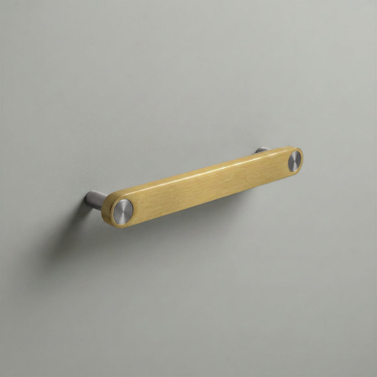 Brass Ensemble Handle in 160mm (6¼″) Centres size with Brushed Steel button detail by Sloan Roberts.