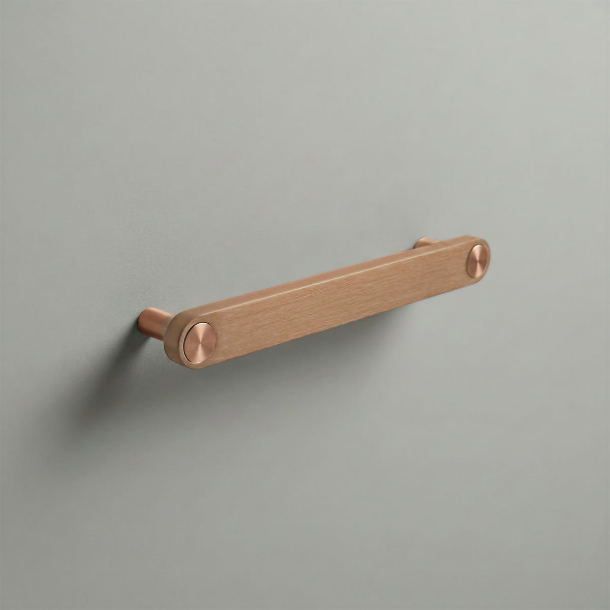 Brushed Copper Ensemble Handle in 160mm (6¼″) Centres size with Brushed Copper button detail by Sloan Roberts.