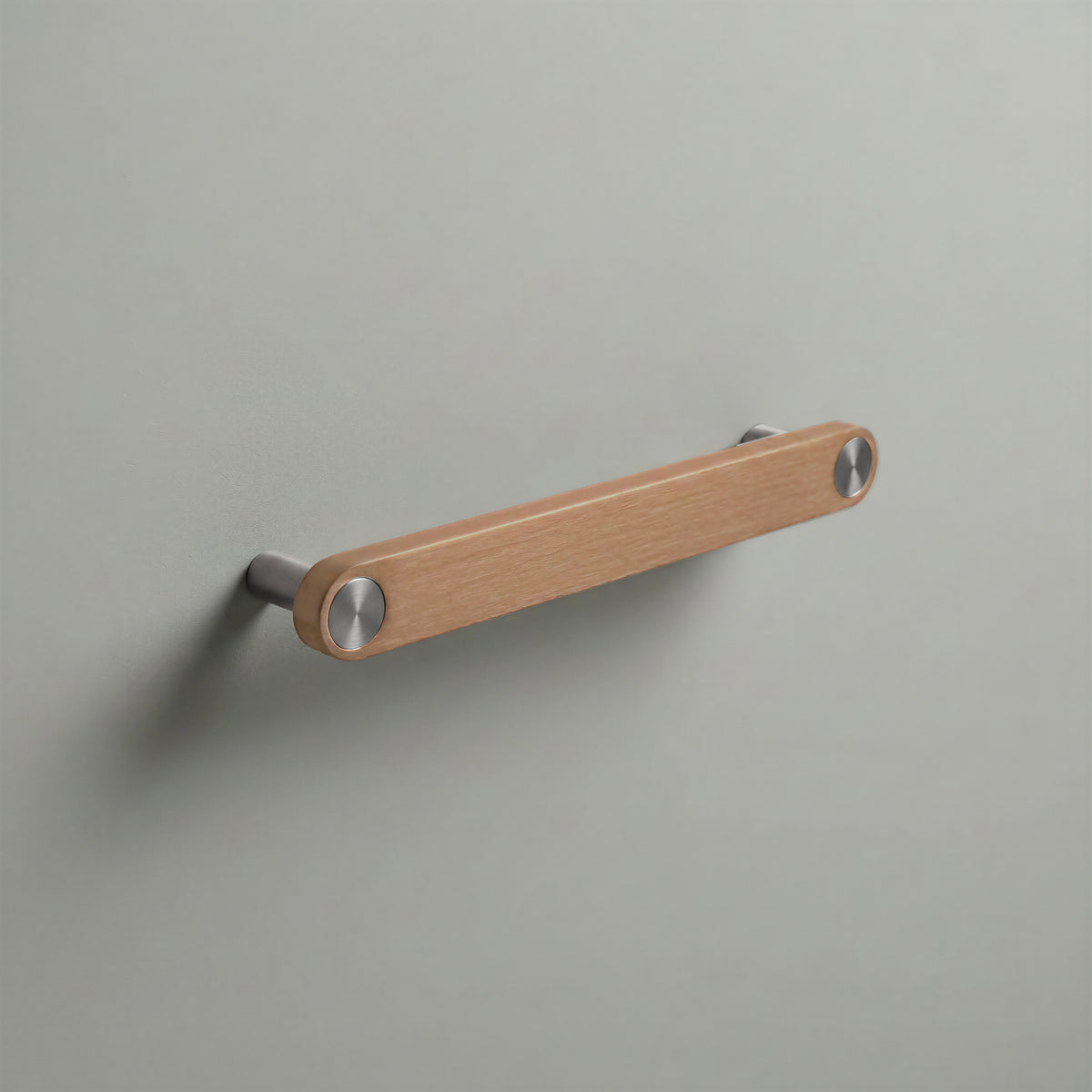 Brushed Copper Ensemble Handle in 160mm (6¼″) Centres size with Brushed Steel button detail by Sloan Roberts.