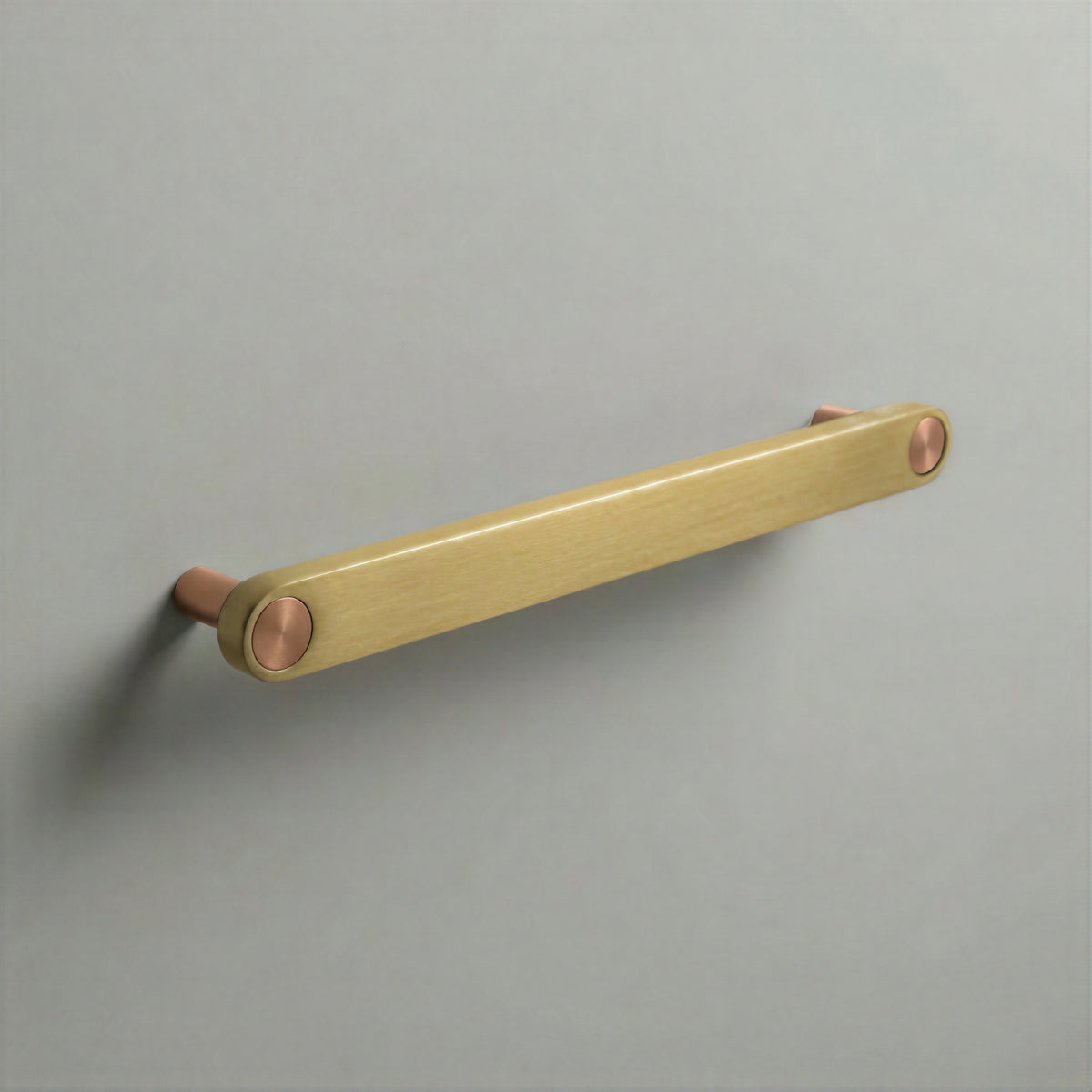 Brass Ensemble Handle in 192mm (7½″) Centres size with Brushed Copper button detail by Sloan Roberts.