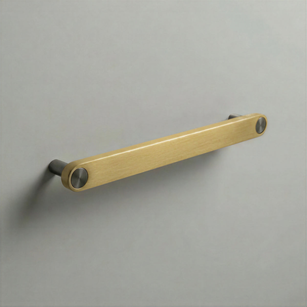 Brass Ensemble Handle in 192mm (7½″) Centres size with Gunmetal button detail by Sloan Roberts.