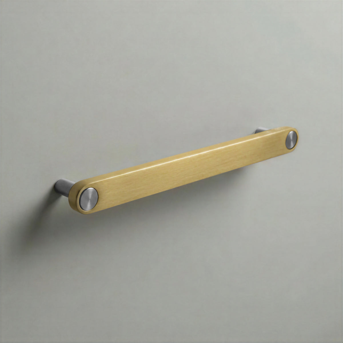 Brass Ensemble Handle in 192mm (7½″) Centres size with Brushed Steel button detail by Sloan Roberts.