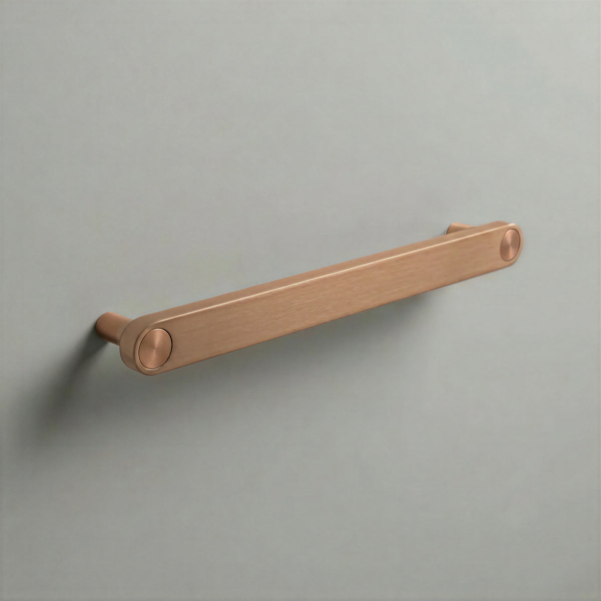 Brushed Copper Ensemble Handle in 192mm (7½″) Centres size with Brushed Copper button detail by Sloan Roberts.
