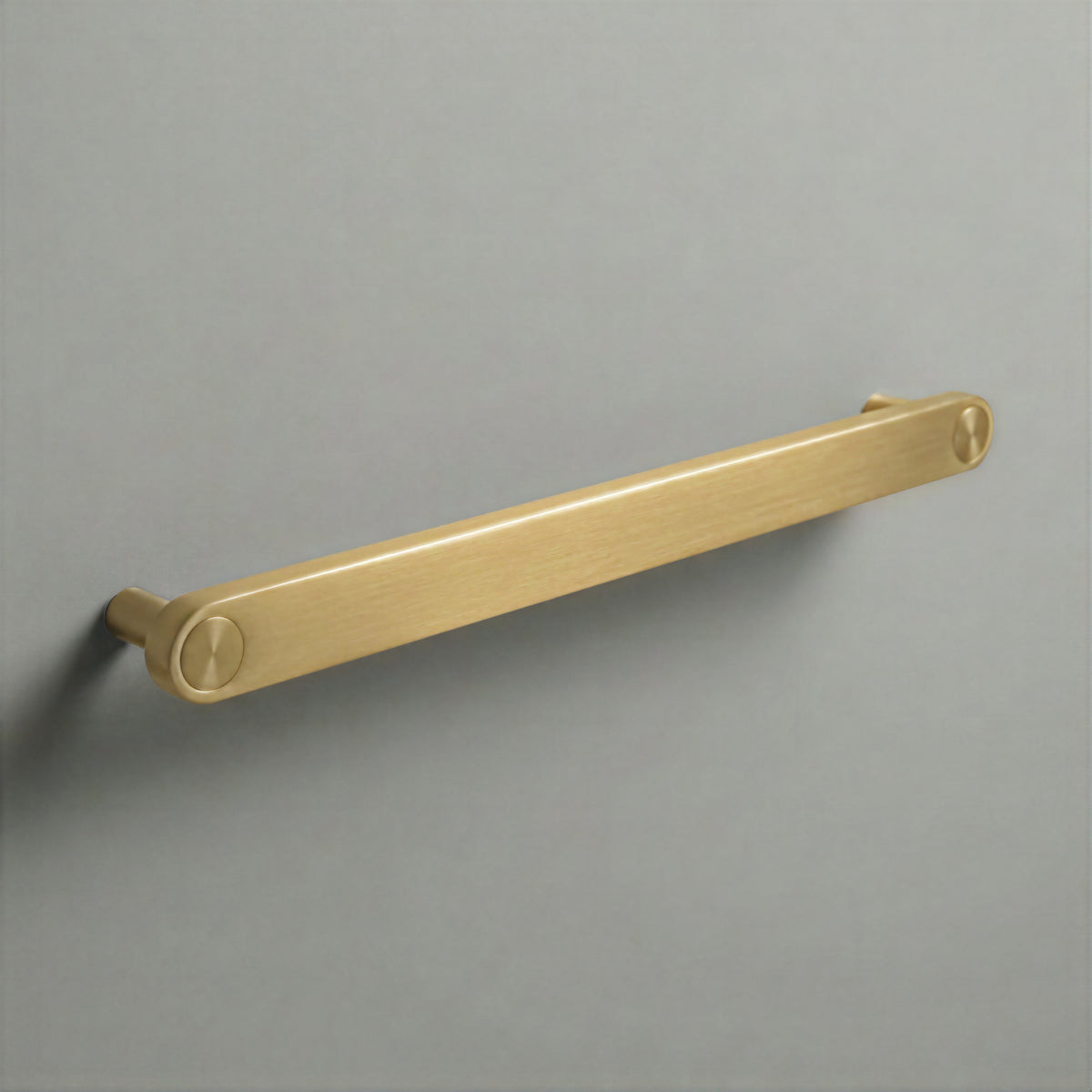 Brass Ensemble Handle in 224mm (8⅞″) Centres size with Brass button detail by Sloan Roberts.