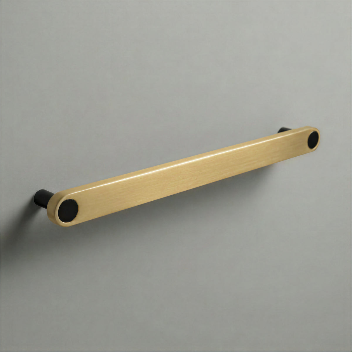 Brass Ensemble Handle in 224mm (8⅞″) Centres size with Matte Black button detail by Sloan Roberts.