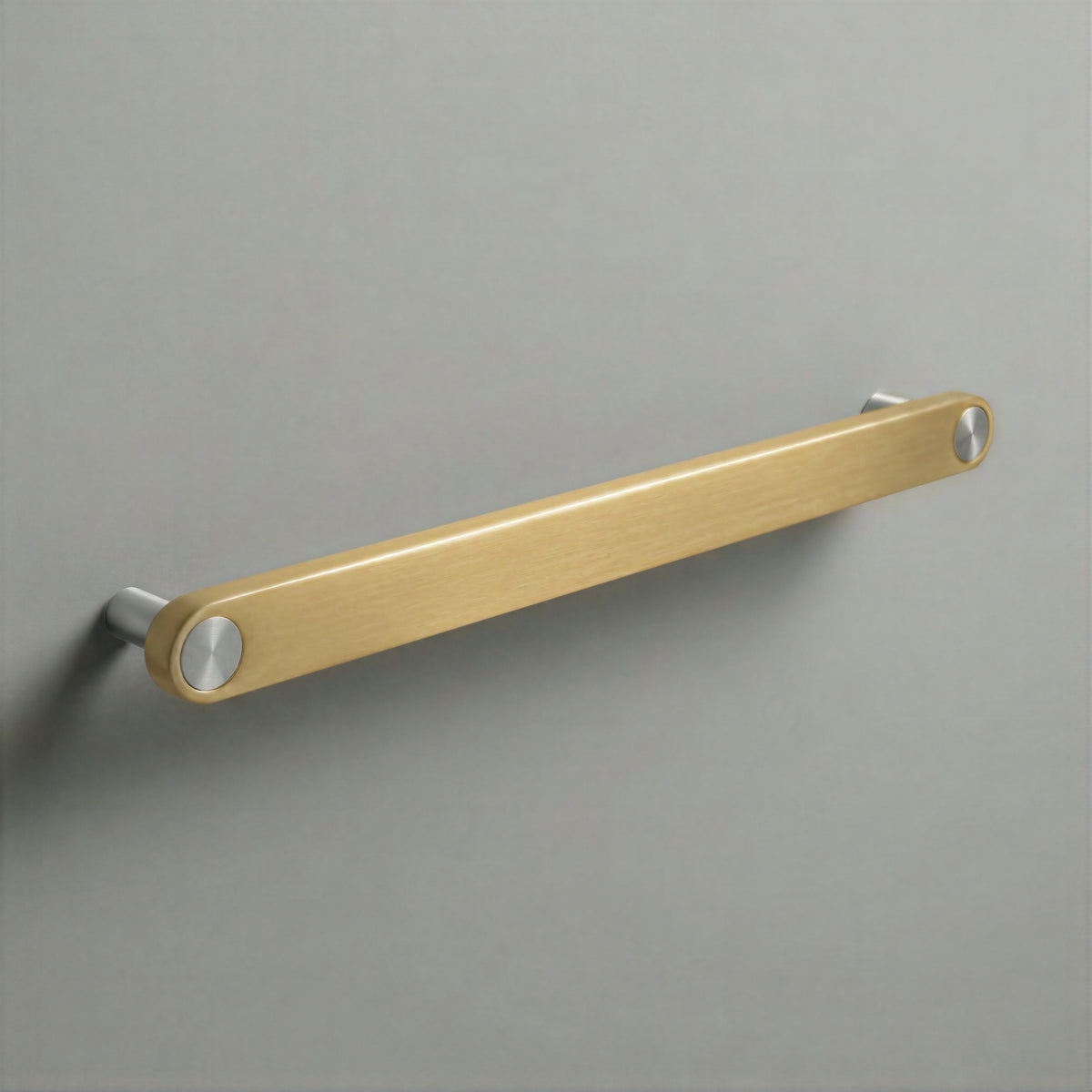 Brass Ensemble Handle in 224mm (8⅞″) Centres size with Brushed Steel button detail by Sloan Roberts.