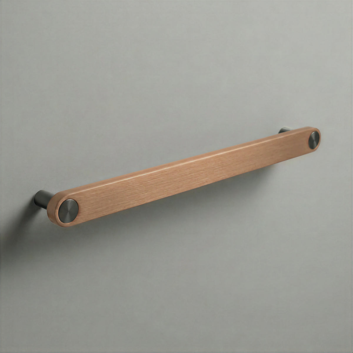 Brushed Copper Ensemble Handle in 224mm (8⅞″) Centres size with Gunmetal button detail by Sloan Roberts.