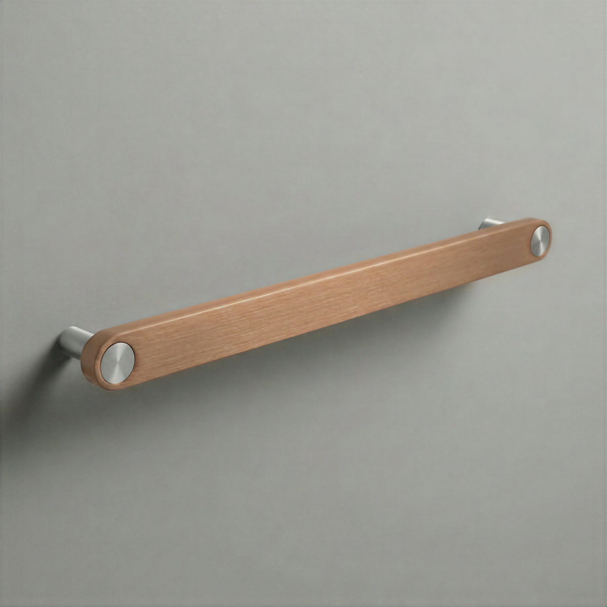 Brushed Copper Ensemble Handle in 224mm (8⅞″) Centres size with Brushed Steel button detail by Sloan Roberts.