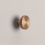 Brushed Copper Ensemble Handle in Knob size with Brass button detail by Sloan Roberts.