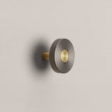Gunmetal Ensemble Handle in Knob size with Brass button detail by Sloan Roberts.