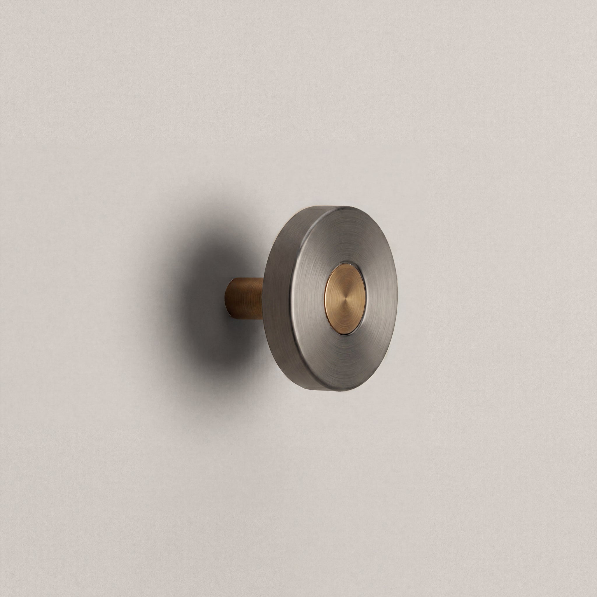 Gunmetal Ensemble Handle in Knob size with Aged Bronze button detail by Sloan Roberts.