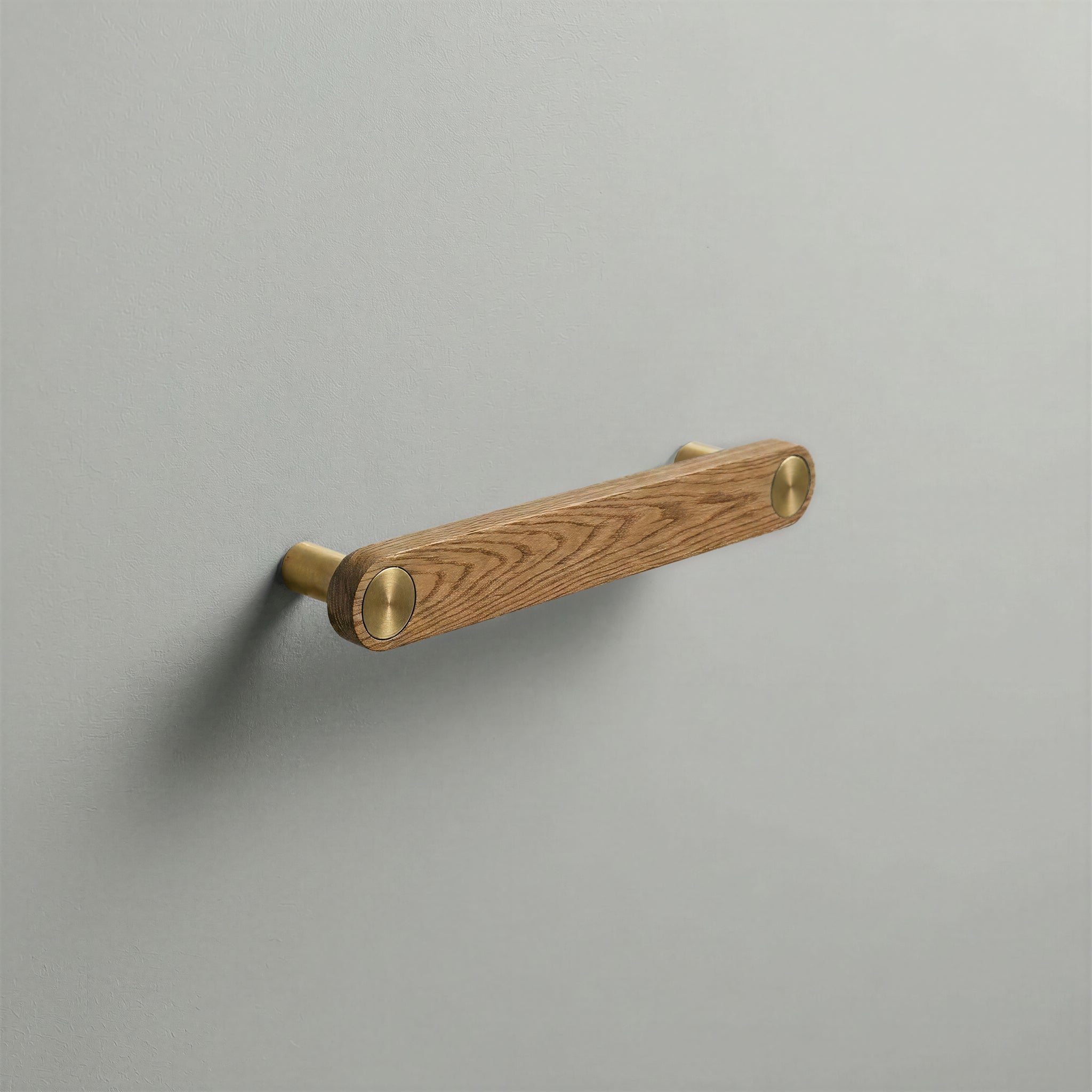 Oak Ensemble Handle in 128mm Centres with Brass button detail by Sloan Roberts.