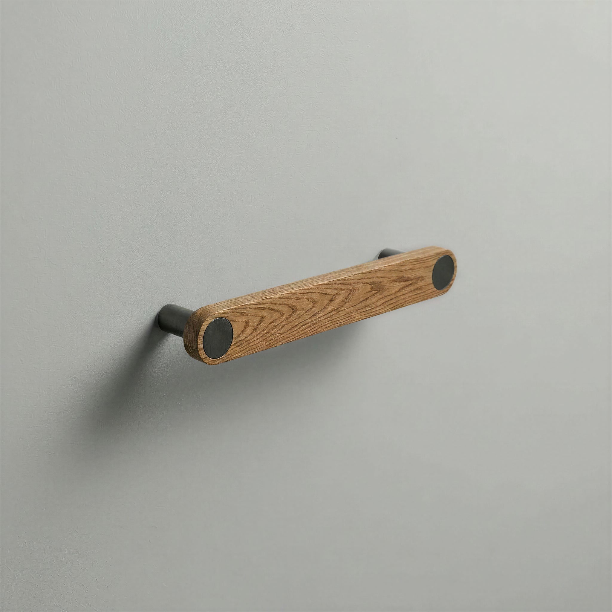 Oak Ensemble Handle in 128mm Centres with Gunmetal button detail by Sloan Roberts.