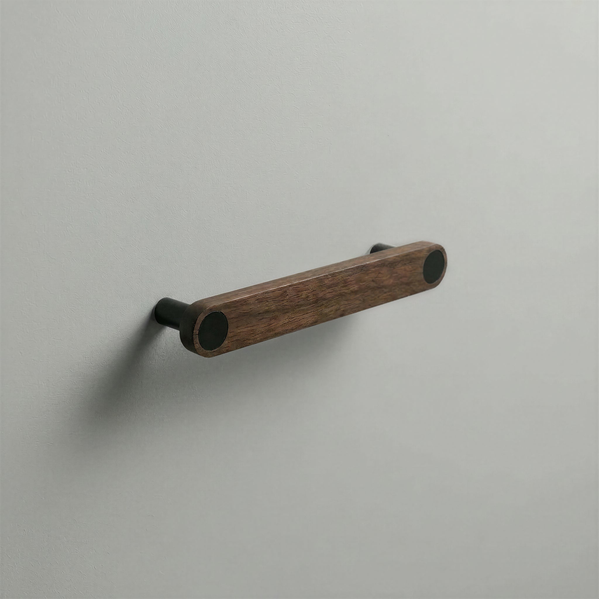 Walnut Ensemble Handle in 128mm Centres with Matte Black button detail by Sloan Roberts.