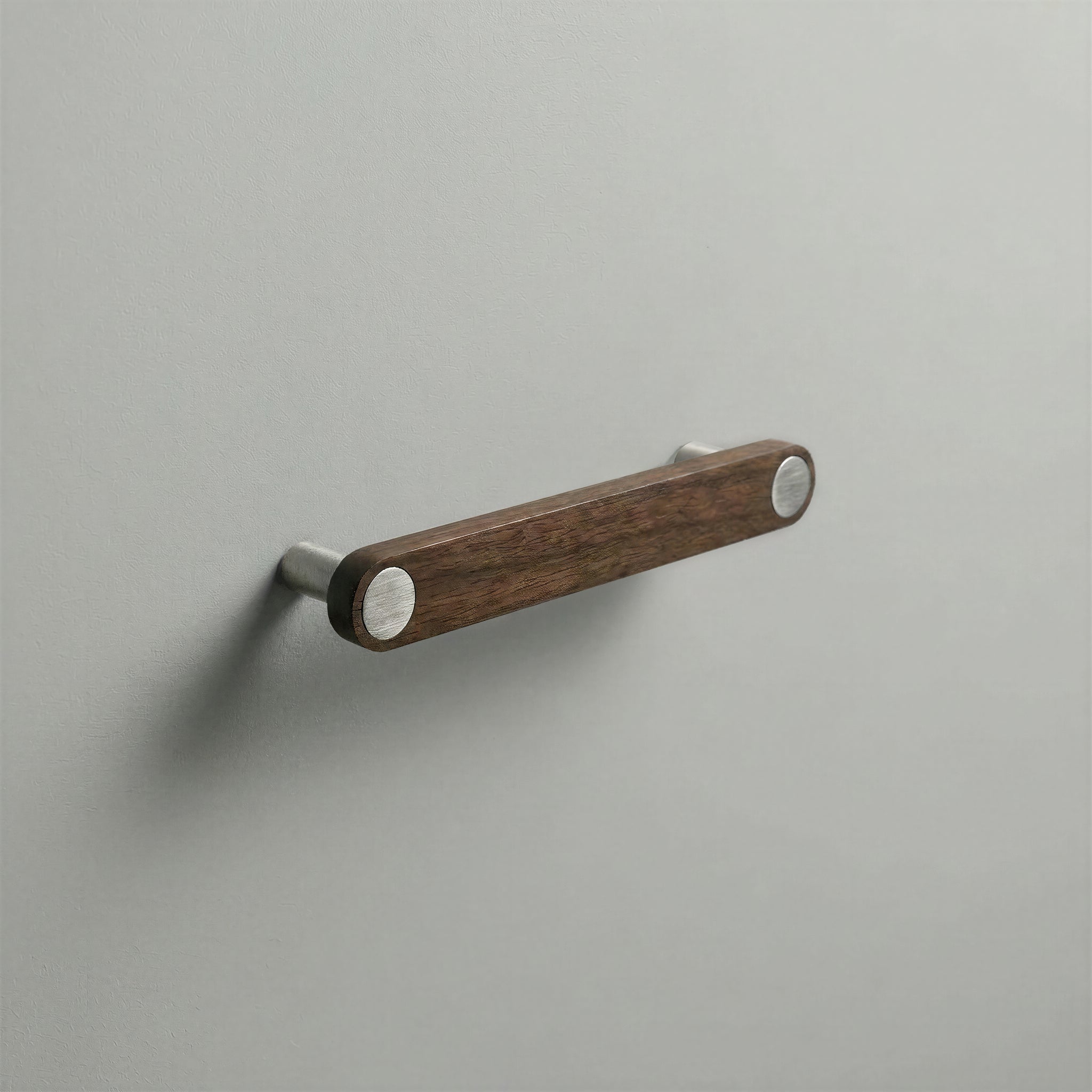 Walnut Ensemble Handle in 128mm Centres with Brushed Steel button detail by Sloan Roberts.
