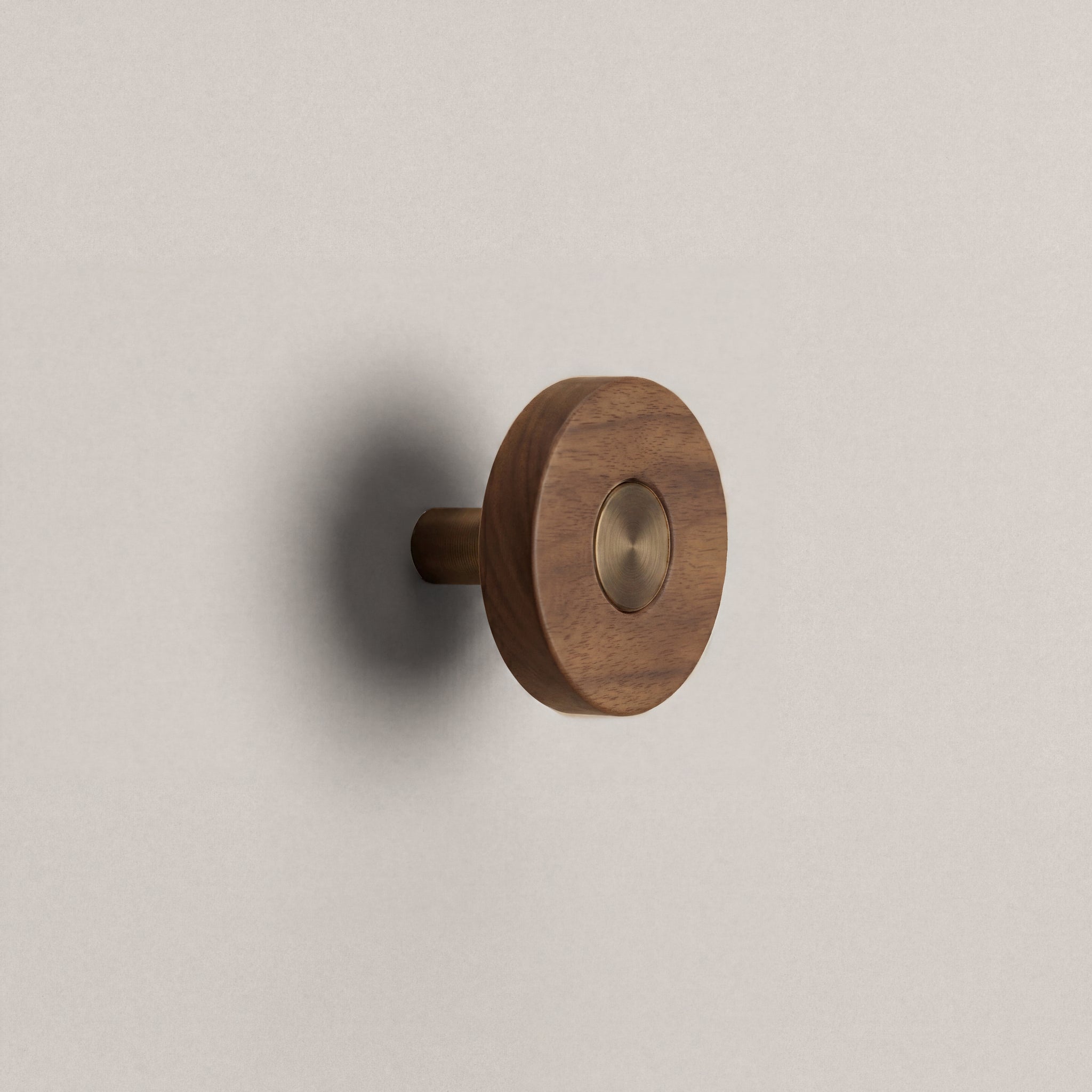 Walnut Ensemble Handle in Knob size with Aged Bronze button detail by Sloan Roberts.